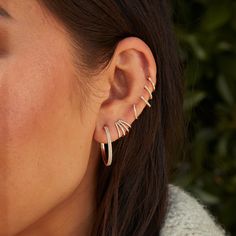 The Gold Mini Huggie Earring is one of our very best sellers—and for good reason. This dainty style crafted from 14k gold is perfect for everyday wear and looks just as good in the lobe as it does higher up the ear. In other words, you can't go wrong with this winner. Single Rose Gold Ear Climber In 14k Gold, Rose Gold Single Ear Climber In 14k Gold, 14k Gold Ear Climbers With Ear Wire, Delicate Rose Gold Huggie Earrings In 14k Gold, Delicate 14k Rose Gold Huggie Earrings, Dainty Rose Gold Sterling Silver Ear Climbers, Minimalist 14k Gold Huggie Ear Climbers, Rose Gold Minimalist Diamond Earrings For Pierced Ears, Everyday Rose Gold Sterling Silver Ear Climbers