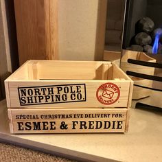 two wooden boxes sitting on top of a counter