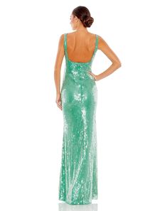 You will be an enchanting beauty in this Mac Duggal 93725 creation. Walk in seduction and style as you wear this stunning sequined mesh overlay gown with a sleeveless square neckline that completely complements the open back, closed with a back zipper closure. The sheath skirt ends in a floor-length hemline. Dress to impress at your next formal event in this simple but captivating Mac Duggal 93725 creation. Model is wearing a Jade Green color. Style: macd_93725 Fabric: Sequined Mesh Overlay Coll Rental Wedding Dresses, Emerald Bridesmaid Dresses, Colorful Dresses Formal, Chain And Pendant, Stunning Prom Dresses, Sequin Formal Dress, Plus Size Cocktail Dresses, Plus Size Party Dresses, Sequin Evening Dresses