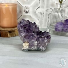 This mesmerizing Brazilian purple Amethyst is a true gemstone that boasts a rich violet hue accompanied by facets that sparkle in the light. The golden goethite inclusions within this gem create a unique, enchanting pattern. Approximate Size:L: 3.40" x W: 3.00" x H: 2.90"Approximate Weight:1.10 lbs. We make and carry many unique and one-of-a-kind items made of materials from around the world. Some may come with imperfections because they're natural. Appearances of cracks and chips aren't due to Faceted Amethyst Spiritual Gemstone, Lavender Amethyst Geodes For Spiritual Use, Mystical Purple Gemstone Crystals, Purple Mystical Gemstone Crystals, Large Purple Spiritual Stone Crystals, Spiritual Large Stone Purple Amethyst Ring, Purple Mystical Crystals, Spiritual Large Purple Stone Crystals, Spiritual Large Purple Crystals