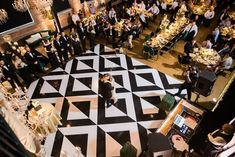 an overhead view of a wedding reception at night