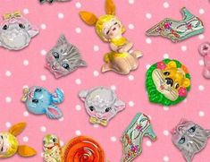 there are many different types of pins on this pink background