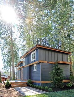 a small house in the middle of some trees