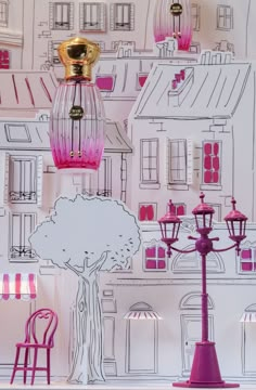 pink and gold lamps on display in front of a wallpapered cityscape