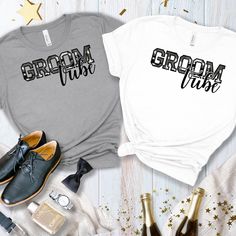 🎉 Celebrate your big day with our custom groomsmen T-shirt! Perfect for groomsmen proposals, bachelor parties, and Vegas trips. Personalize to make each shirt unique for your crew. Ideal gift for your best buddies! 🎉👔 #Groomsmen #BachelorParty #Wedding 🌟 Fabrication: 100% Airlume combed and ring-spun cotton 🧶 🧵 Seams: Side-seamed 🔄 👕 Fit: Retail Fit 🛍️ 📏 Sizing: Unisex Sizing ️ 🏷️ Label: Tear away label 🏷️ 📦 Hassle-Free Ordering Process (FREE SHIPPING FOR ORDERS OVER $35):  1. Select your Size/Style. 2. Choose your shirt Color.  3. Enter your personalization in the space provided. NOTE: Please state exactly what you would like customized for following the directions and examples pictured. 💡 Pro tip: Confirm changes before placing your order to ensure your order is perfect!  ⚡ Groomsmen Proposals, Bachelor Gifts, Best Buddies, Bachelor Parties, Vegas Party, Groomsmen Proposal, Vegas Trip, Groomsmen Gifts, Good Buddy