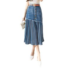 Pleated women's denim skirt online—excellent jeans skirt from the 2022 Spring-Summer collection. The fashionable outfit helps to look modern and draws the attention of others. Bright yet understated enough to not seem OTT, this blue denim catches the eye at first glance. This medium wash design highlights simple fading to give the denim an open, broken-in appearance. Depending on your mood, the pleated model can be dressed down with flats and a biker blazer or dressed up with fabulous heels and Summer Denim Knee-length Skirt, Spring Denim Knee-length Skirt, Spring Medium Wash Knee-length Skirt, Chic Knee-length Denim Skirt For Summer, Non-stretch Denim Skirt For Summer, Summer Non-stretch Denim Skirt, Chic Summer Lined Denim Skirt, Knee-length Blue Denim Skirt For Summer, Spring Knee-length Lined Denim Skirt