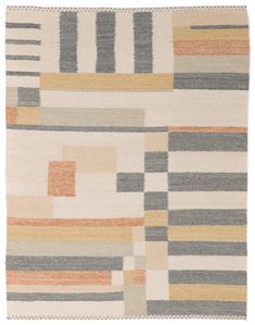 an area rug with different colors and shapes