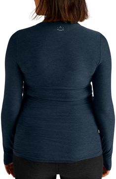 Strike your best pose in this easy-moving top designed with comfortable stretch. 26 1/2" length (size Medium) Crewneck Long sleeves with thumbhole cuffs 94% polyester, 6% spandex Machine wash, tumble dry Made in the USA of imported fabric Versatile Soft Stretch Long Sleeve Top, Versatile Long Sleeve Top With Soft Stretch, Versatile Stretch Long Sleeve Top With Thumbholes, Blue Top With Thumbholes For Fall, Blue Tops With Thumbholes For Fall, Four-way Stretch Top With Thumbholes, Versatile High Stretch Tops With Thumbholes, Stretch Long Sleeve Top With Thumbholes For Layering, Fall Yoga Tops With Crew Neck