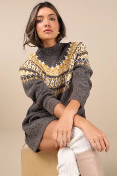 Grab your coziest booties and the Lulus Wintertime Comfort Charcoal Fair Isle Sweater Mini Dress for a perfect snow day 'fit! Soft and fuzzy medium-gauge knit shapes this chic sweater dress that has a mock neckline and long sleeves. Yellow and white Fair Isle-style patterning decorates the yoke, atop a shift-style silhouette that creates an ultra-comfy fit as it falls to a mini hem. Ribbed knit accents the neckline, cuffs, and hem. Fit: This garment fits true to size. Length: Mid-thigh. Size med Charcoal Sweater, Sweater Mini Dress, Chic Sweater, Chic Sweaters, Mini Sweater Dress, Fair Isle Sweater, Mock Neckline, Snow Day, Winter Time