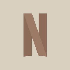 the letter n is made up of brown paper