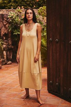 The definition of effortless, this timeless midi from our free-est collection is perfect from the shore to the street. **Fit:** Relaxed, barrel-inspired fit **Features:** Scoop neckline, side pockets, undone hem seam, soft cotton fabrication **Why We ❤ It:** Beachy with sandals or off-duty with sneakers, this style has endless ways to wear. | Perth Barrel Tee Midi Dress by free-est at Free People in Tan, Size: S Extra Dresses, Free People Summer, Beach Styles, Beach Clothing, Short Story, Black Fits, Summer Tops, Jeans Dress, Boho Outfits