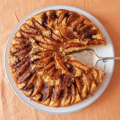 a cake on a plate with a fork in it