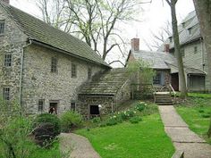 an old stone house in the woods