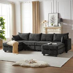 a living room filled with furniture and a rug