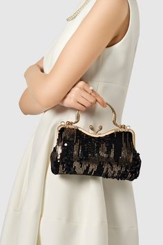 Chic, glamorous and incredibly luxurious, this flapper clutch, with its unique detailing and minimalist design, is a must for any of your big entrances. Features: Glittering sequin decoration Unique kiss lock Detachable chain strap design( Length: 47.2 inch / 120 cm) 8inch / 24.9 cm x 5.3 inch / 13.5 cm ( L x H ) Glamorous Sequined Bags For Events, Glamorous Sequined Event Bag, Glamorous Event Bags With Sequins, Chic Sequined Clutch Bag, Glamorous Sequin Bag For Night Out, Glamorous Rectangular Sequined Evening Bag, Sequined Rectangular Clutch For Events, Glamorous Sequin Clutch Bag, Rectangular Sequin Clutch For Events