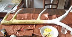 the antler is ready to be painted with yellow paint