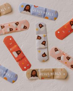 the jesus heals bookmarks are laid out on top of each other with different designs