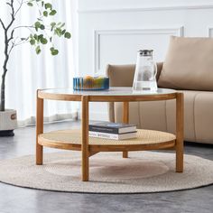 a coffee table with books on it in a living room