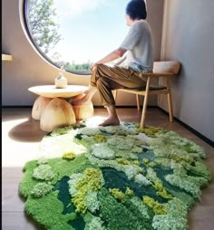 a person sitting on a chair in front of a round window