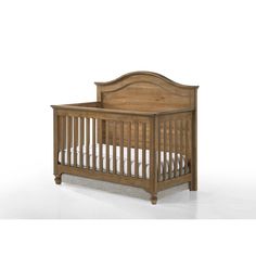 a wooden crib with white sheets on the bottom and bottom, in front of a white background