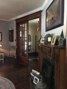 a living room filled with furniture and a fire place