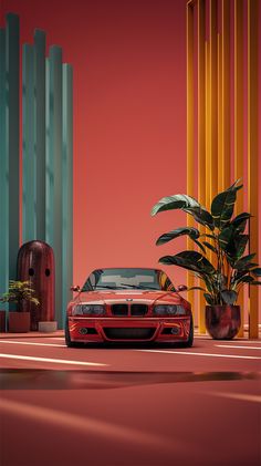 a red sports car parked in front of tall columns