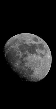 the moon is shown in black and white with no clouds on it's side