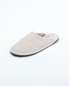 The Le Clare women's Stella in beige is the classic "hotel slipper" reimagined in luxurious boiled wool. This quintessential house slipper provides delicate comfort, featuring our premium Italian boiled wool fiber, the slipper gently conforms to your foot for cozy comfort. Classic Closed Toe Winter Slippers, Classic Slip-on Indoor Slippers, Classic Beige Slippers With Round Toe, Classic Beige Round Toe Slippers, Wool Indoor Slip-on Slippers, Indoor Wool Slip-on Slippers, Indoor Wool Slippers With Rubber Sole, Wool Slip-on Indoor Slippers, Cozy Beige Closed Toe Slippers