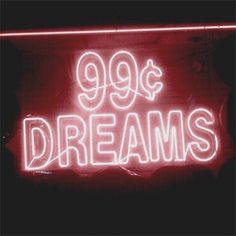 a neon sign that reads 99 cents dreams