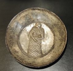 a bowl with an image of a person on it