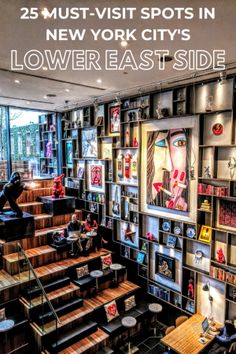 the inside of a restaurant with lots of bookshelves and pictures on the wall