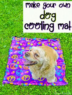 a dog laying on top of a purple and green blanket with a sign that says make your own dog cooling mat