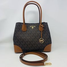 Michael Kors Mercer Gallery Medium Brown/Tan Tote Signature Print Beautiful Bag Excellent Condition Corners Have Little Wear Priced Accordingly Please Refer To Photos For Full Description And Condition Michael Kors Mercer, Bags Michael Kors, Zip Tote, Signature Print, Medium Brown, Beautiful Bags, Bags Handbags, Shoe Accessories, Michael Kors