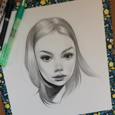 a pencil drawing of a woman's face