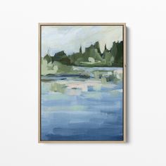 a painting hanging on the wall next to a white wall with a wooden frame in front of it