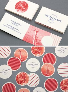 two business cards with red and white circles on them, sitting next to each other