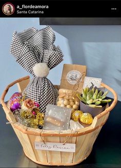 a basket filled with assorted items sitting on top of a table