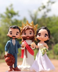 a wedding cake topper with the bride and groom