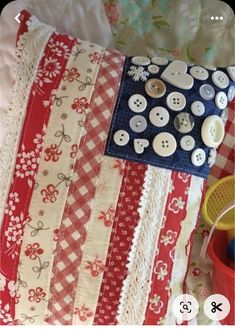 an american flag pillow with buttons on it