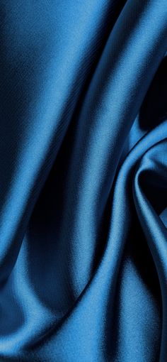 a close up view of a blue fabric