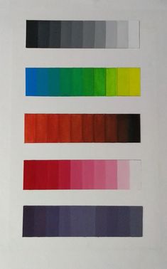 an image of color swatches on a white paper with red, green, blue, and yellow colors