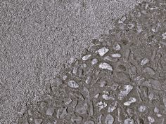 an image of rocks and pebbles in the sand