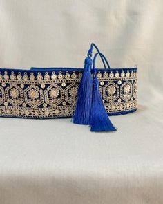 Embroidered obi belt with tassels, handmade in Paris using embroidered indian laces sourced in the mythic city of Jaipur. They are the perfect accessory to transform any boring dress in a boho statement piece.  We love it's exotic & vintage look and we are sure you will love it too!  HOW TO CLOSE THE BELT:  The belt features satin straps with tassels at the end that you can tie around your waist to show the tassels on the front or at the back.  MATERIALS: The belts are lined with a linen or cott Tassels Handmade, Dark Blue Velvet, Polycotton Fabric, Obi Belt, Unique Accessories, Indian Heritage, Suspender Belt, Boho Bag, Flower Embroidery