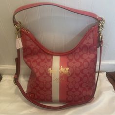 For The Pink Lovers! This Gorgeous And Practical Coach Signature Bag Is Nwt And Comes With A Long Crossbody Strap. Elevate Your Style With This Stunning Coach 13193 Heritage Stripe Signature Convertible Magenta Canvas Hobo Bag. This Bag Is Perfect For Women Who Want To Add A Touch Of Sophistication To Their Wardrobe. The Bag Features A Striped Pattern With A Magenta Hue, Which Makes It Stand Out From The Rest. The Exterior Material Is Made From Quality Leather, Which Ensures Durability And Longe Pink Bucket Shoulder Bag With Removable Pouch, Pink Bucket Shoulder Bag With Detachable Handle, Pink Tote Hobo Bag For Errands, Pink Bucket Shoulder Bag For Errands, Pink Rectangular Hobo Bag With Removable Pouch, Rectangular Pink Hobo Bag With Removable Pouch, Pink Crossbody Hobo Bag For Daily Use, Designer Pink Shoulder Bag For On-the-go, Designer Pink Bags For Everyday Use