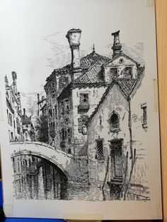 an ink drawing of a bridge and buildings in venice, italy by the water's edge