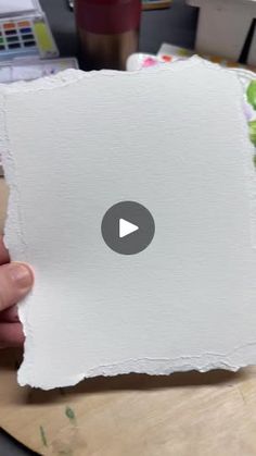 someone is holding up a piece of paper with the video below it that reads, how do you make this?