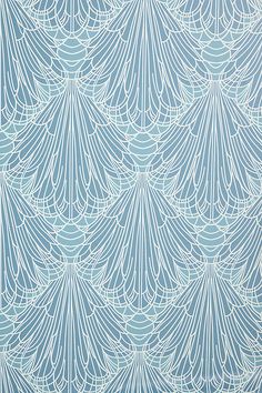 an abstract blue and white wallpaper with wavy lines