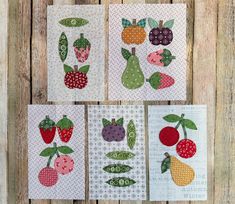 four cards with fruit and vegetables on them