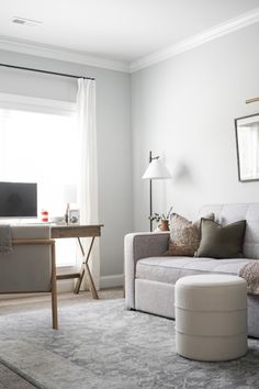 the living room is clean and ready to be used as a work space for someone