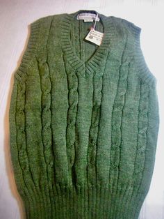 Vintage Tricots St. Raphael 100% pure wool, made in Uruguay, green, v-neck, never worn. Measurements Chest 36 Length 25 in. Classic Wool V-neck Sweater Vest, Wool V-neck Sweater Vest For Winter, Classic Green Wool Sweater, Knitted Wool V-neck Tops, Wool Knitted V-neck Top, V-neck Wool Knitted Tops, Classic Green Knitted Sweater, Green Wool Cable Knit Sweater, Green Wool Casual Tops